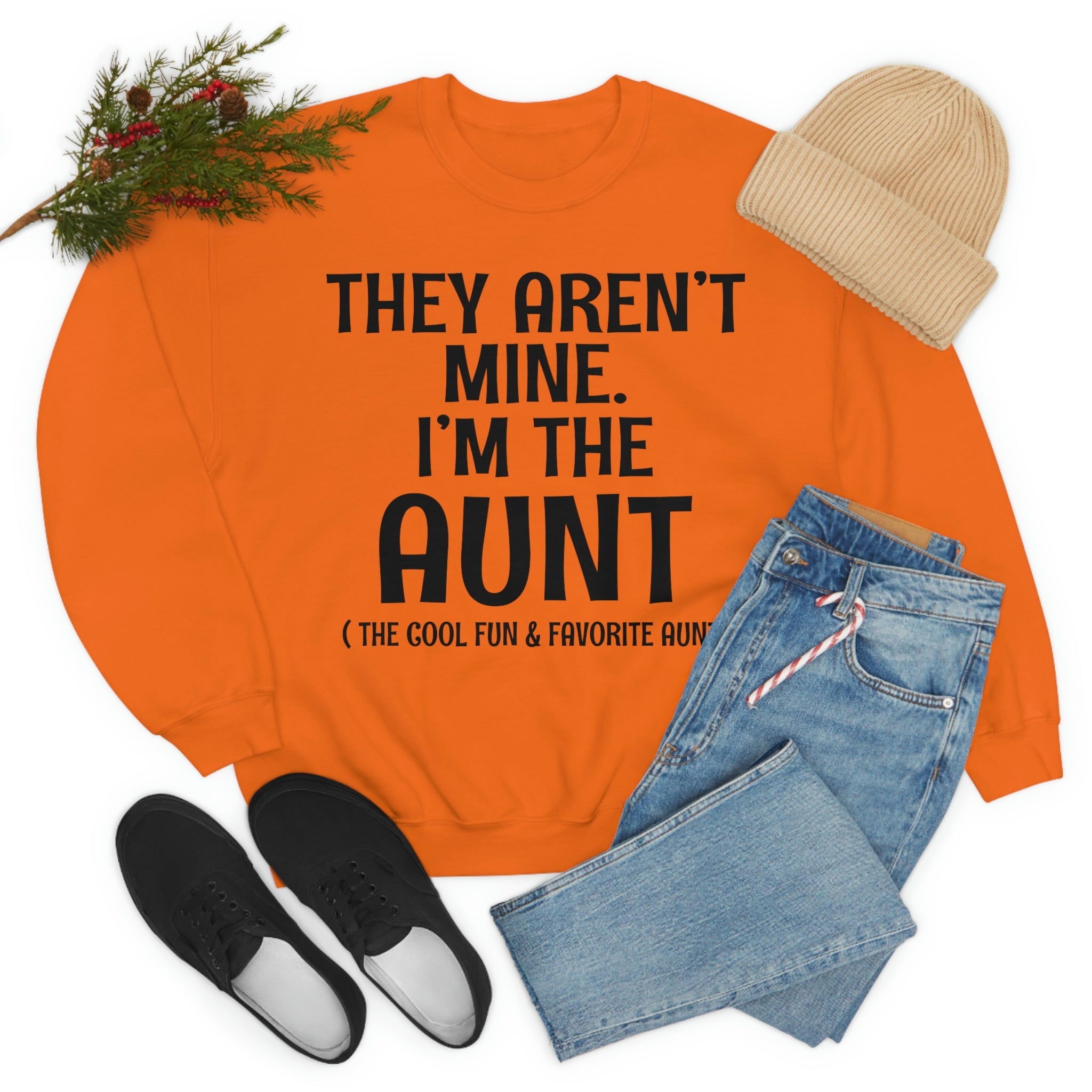 A soft, comfortable t-shirt featuring the phrase 'They Aren't Mine I'm The Aunt' in vibrant print, perfect for proud aunts.