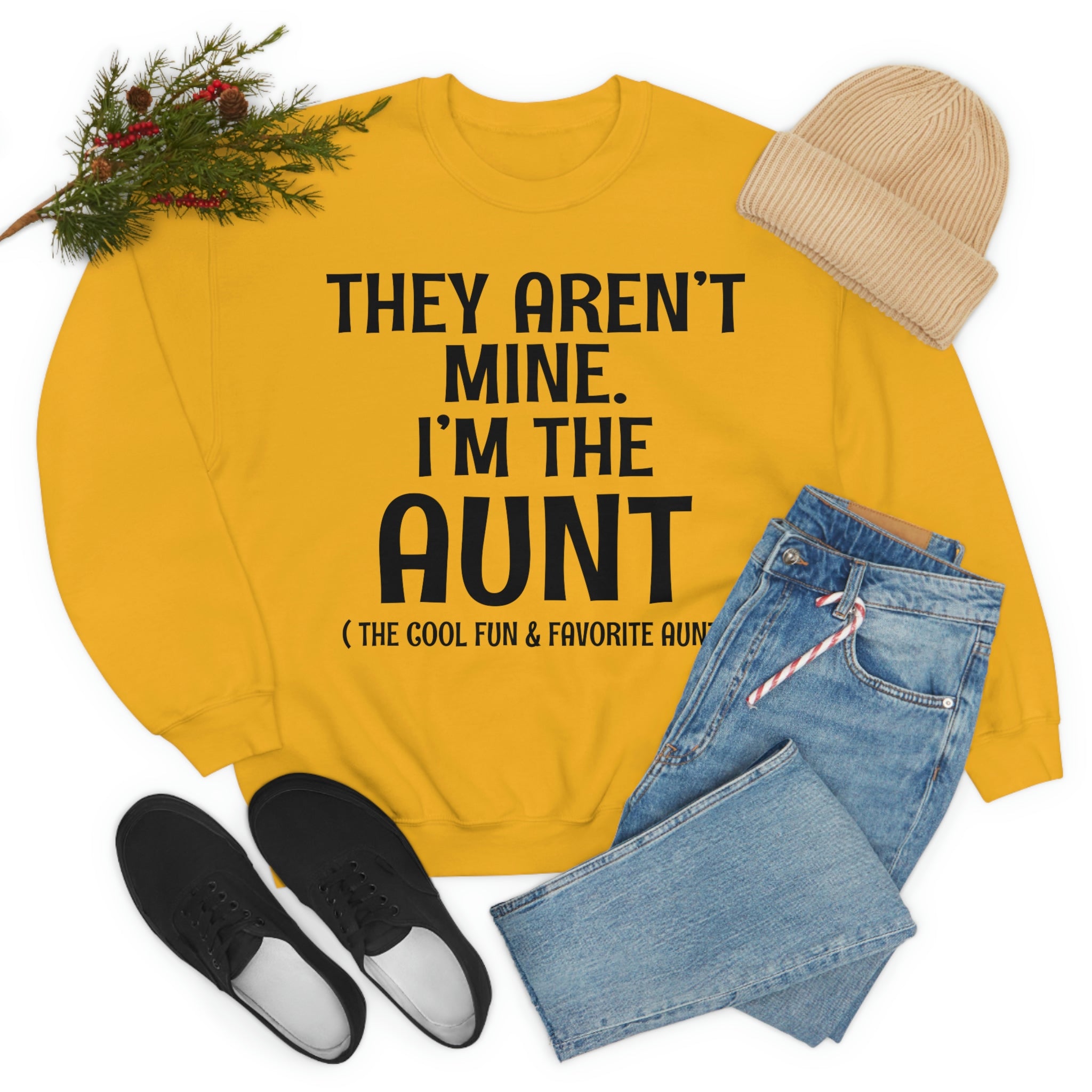 A soft, comfortable t-shirt featuring the phrase 'They Aren't Mine I'm The Aunt' in vibrant print, perfect for proud aunts.