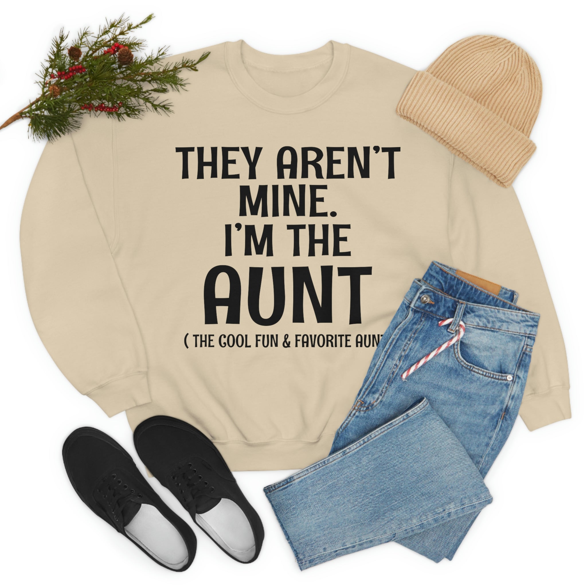 A soft, comfortable t-shirt featuring the phrase 'They Aren't Mine I'm The Aunt' in vibrant print, perfect for proud aunts.