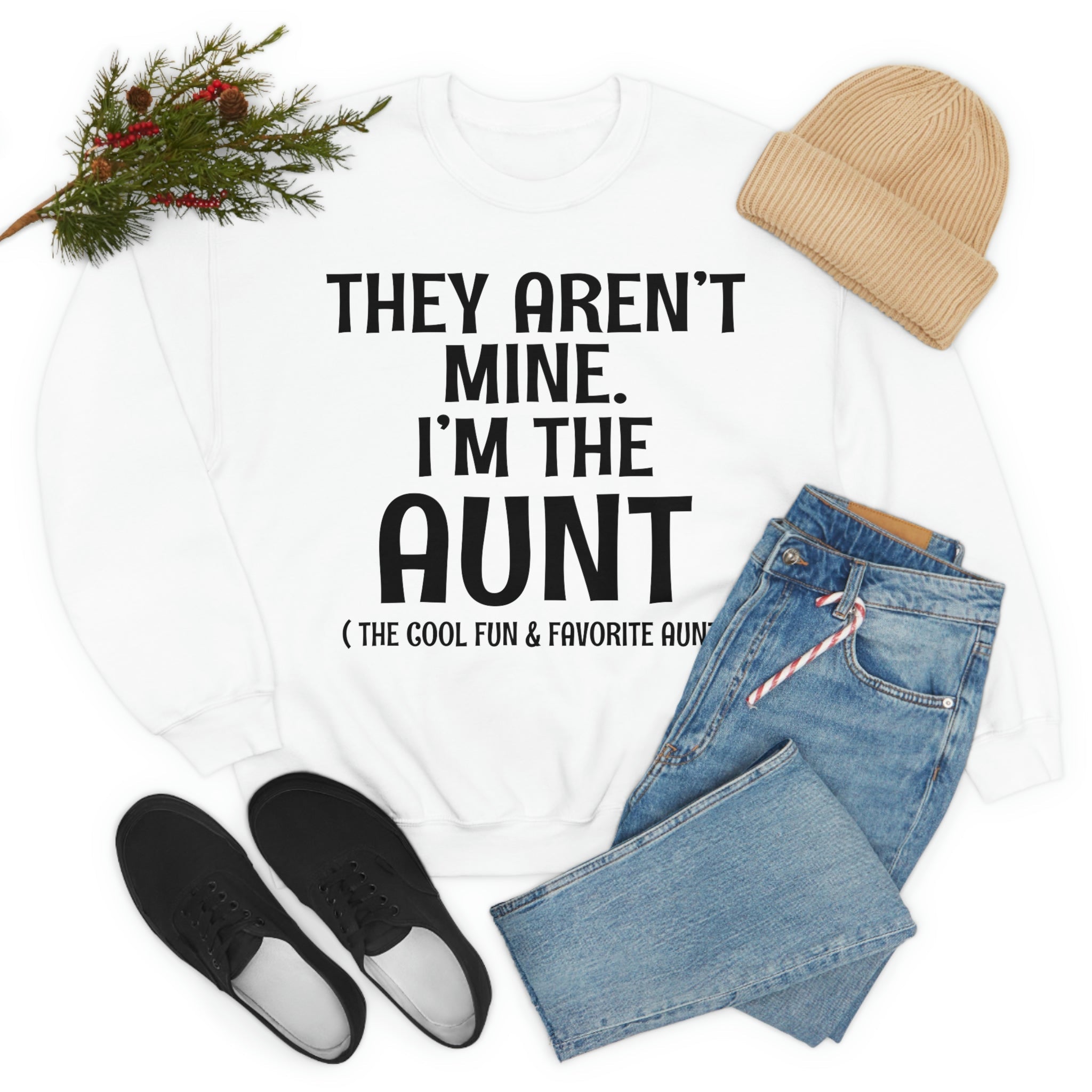 A soft, comfortable t-shirt featuring the phrase 'They Aren't Mine I'm The Aunt' in vibrant print, perfect for proud aunts.