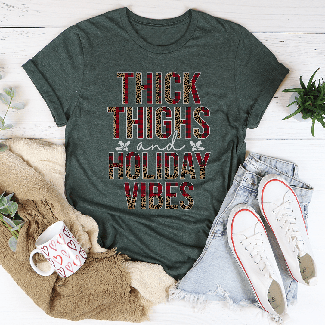 Thick Thighs And Holiday Vibes T-Shirt displayed on a mannequin, showcasing its soft cotton fabric and playful design.