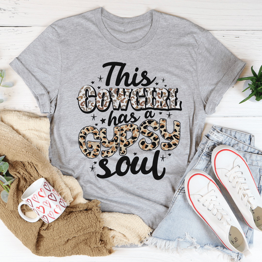 A stylish t-shirt featuring the phrase 'This Cowgirl Has A Gypsy Soul', made from soft cotton with a durable design.