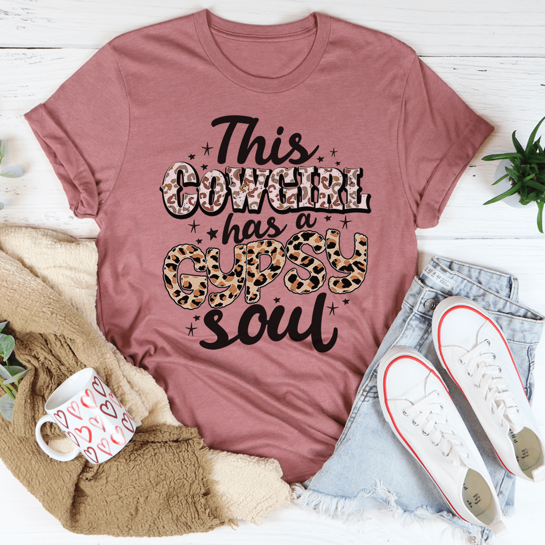 A stylish t-shirt featuring the phrase 'This Cowgirl Has A Gypsy Soul', made from soft cotton with a durable design.