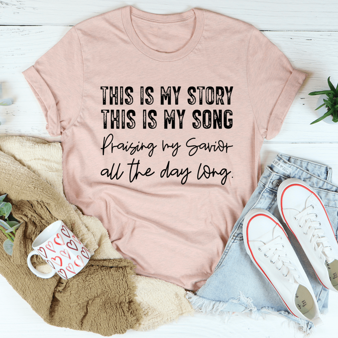 A comfortable and stylish 'This Is My Story This Is My Song' T-Shirt made from soft ring-spun cotton, featuring double stitching for durability.