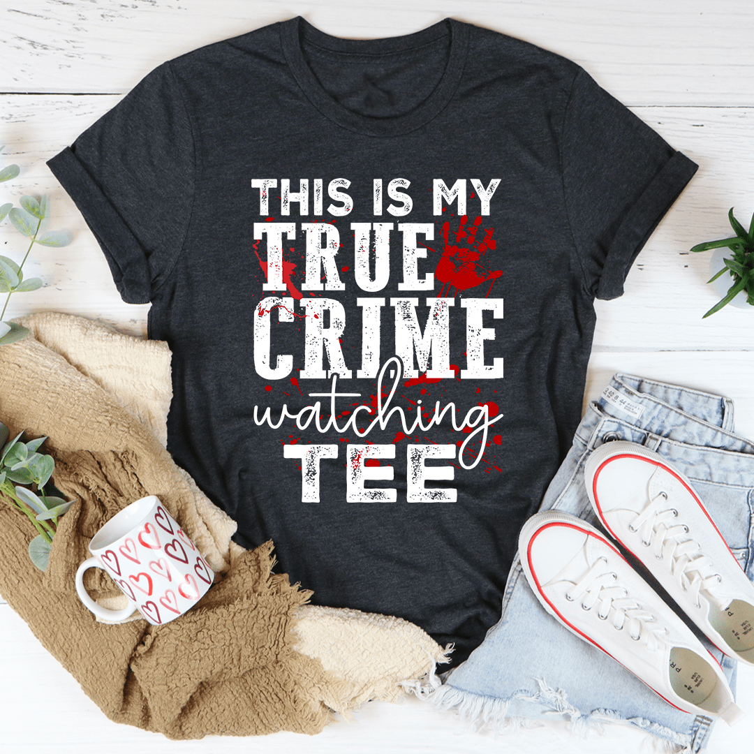 A comfortable and stylish t-shirt featuring the phrase 'This Is My True Crime Watching T-Shirt', made from soft ring-spun cotton.