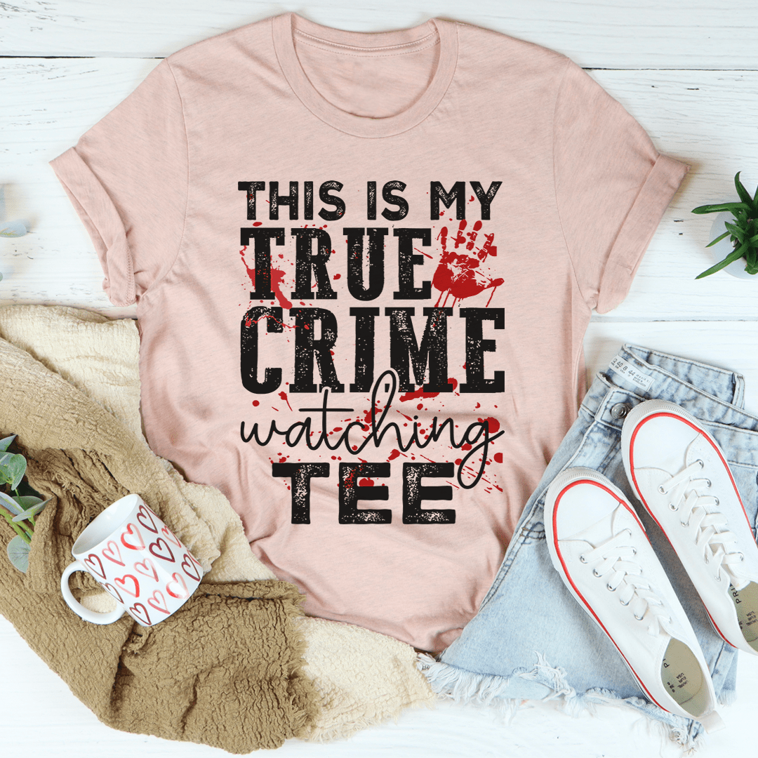 A comfortable and stylish t-shirt featuring the phrase 'This Is My True Crime Watching T-Shirt', made from soft ring-spun cotton.