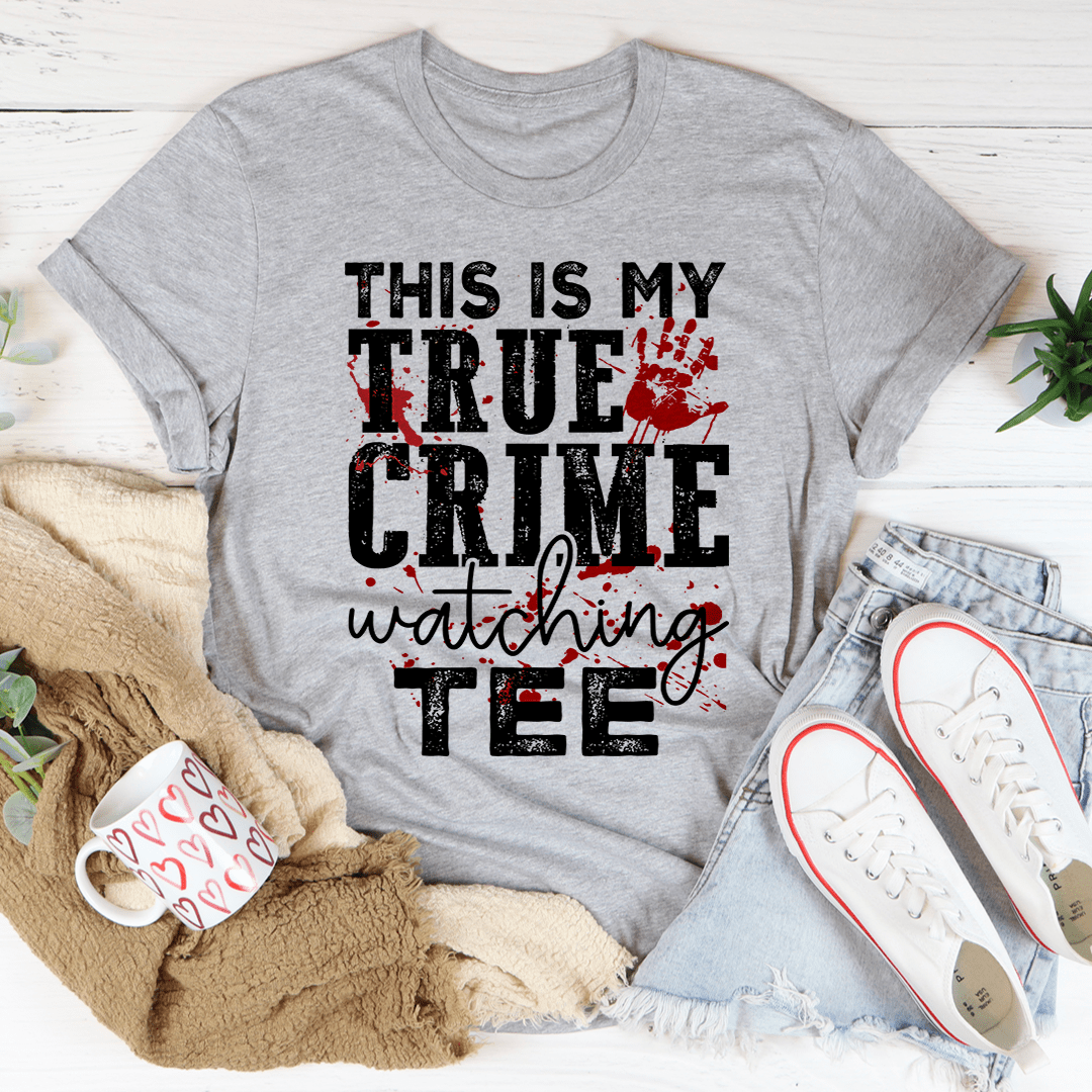 A comfortable and stylish t-shirt featuring the phrase 'This Is My True Crime Watching T-Shirt', made from soft ring-spun cotton.