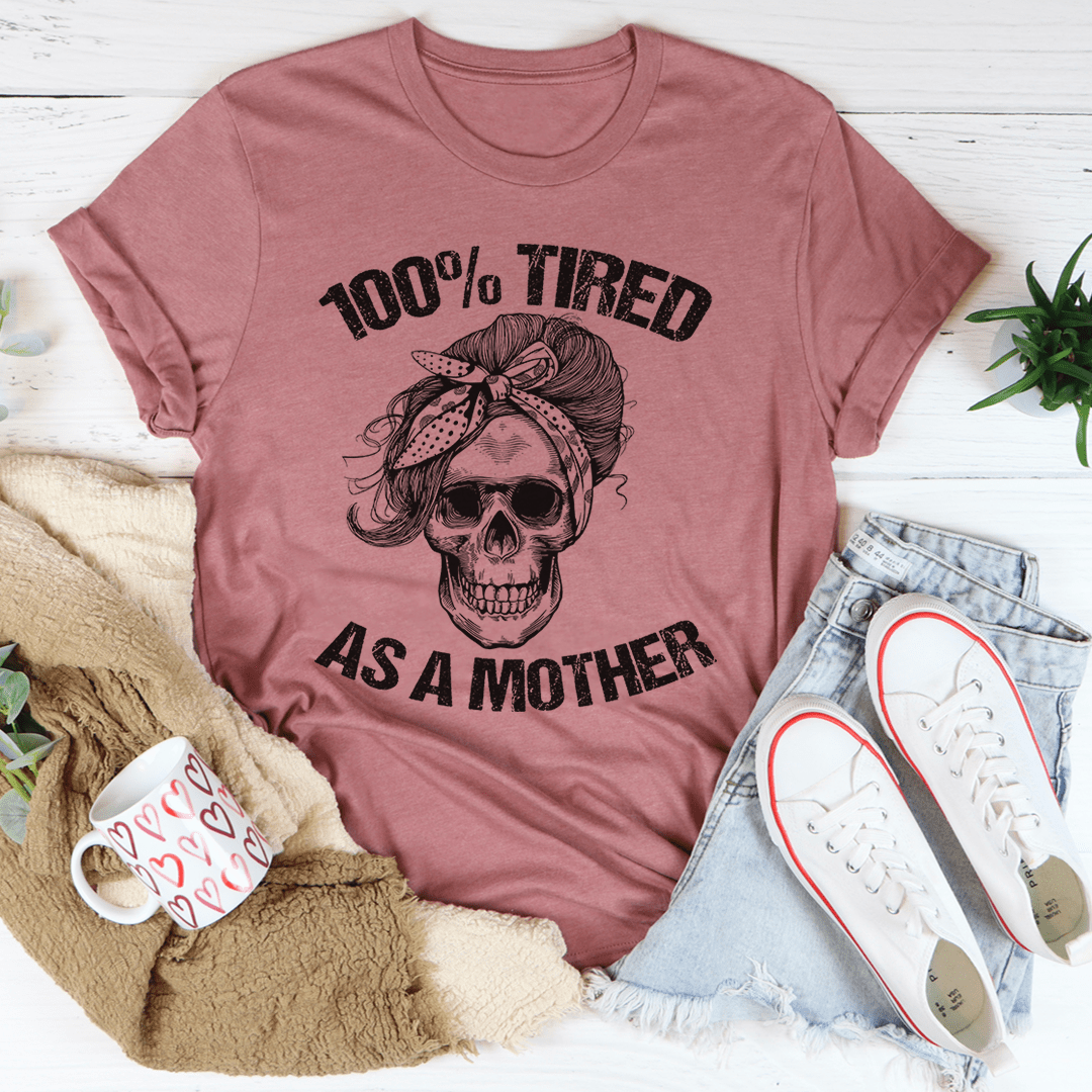 A stylish Tired As A Mother Tee made of soft ring-spun cotton, featuring double stitching for durability and a comfortable fit.