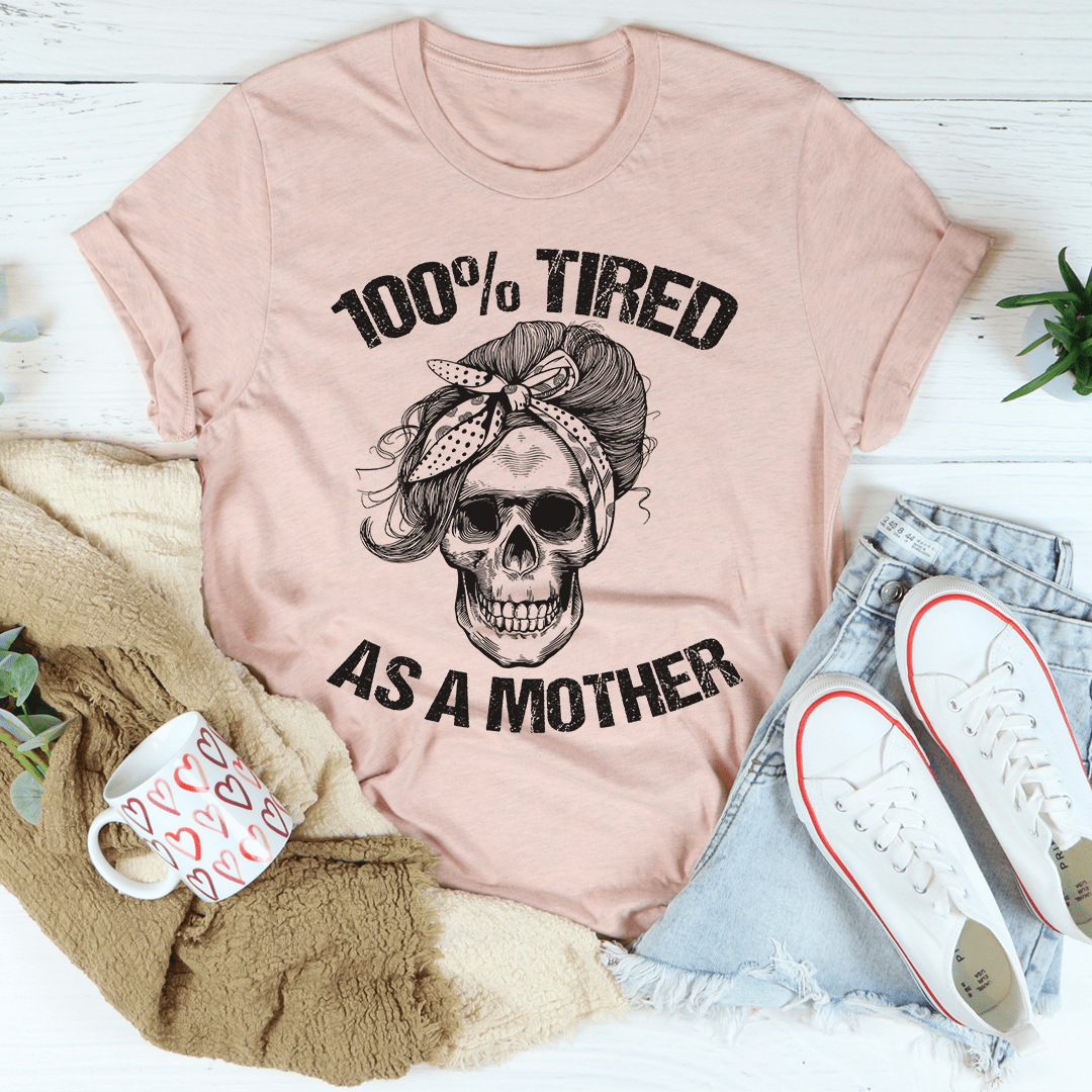 A stylish Tired As A Mother Tee made of soft ring-spun cotton, featuring double stitching for durability and a comfortable fit.