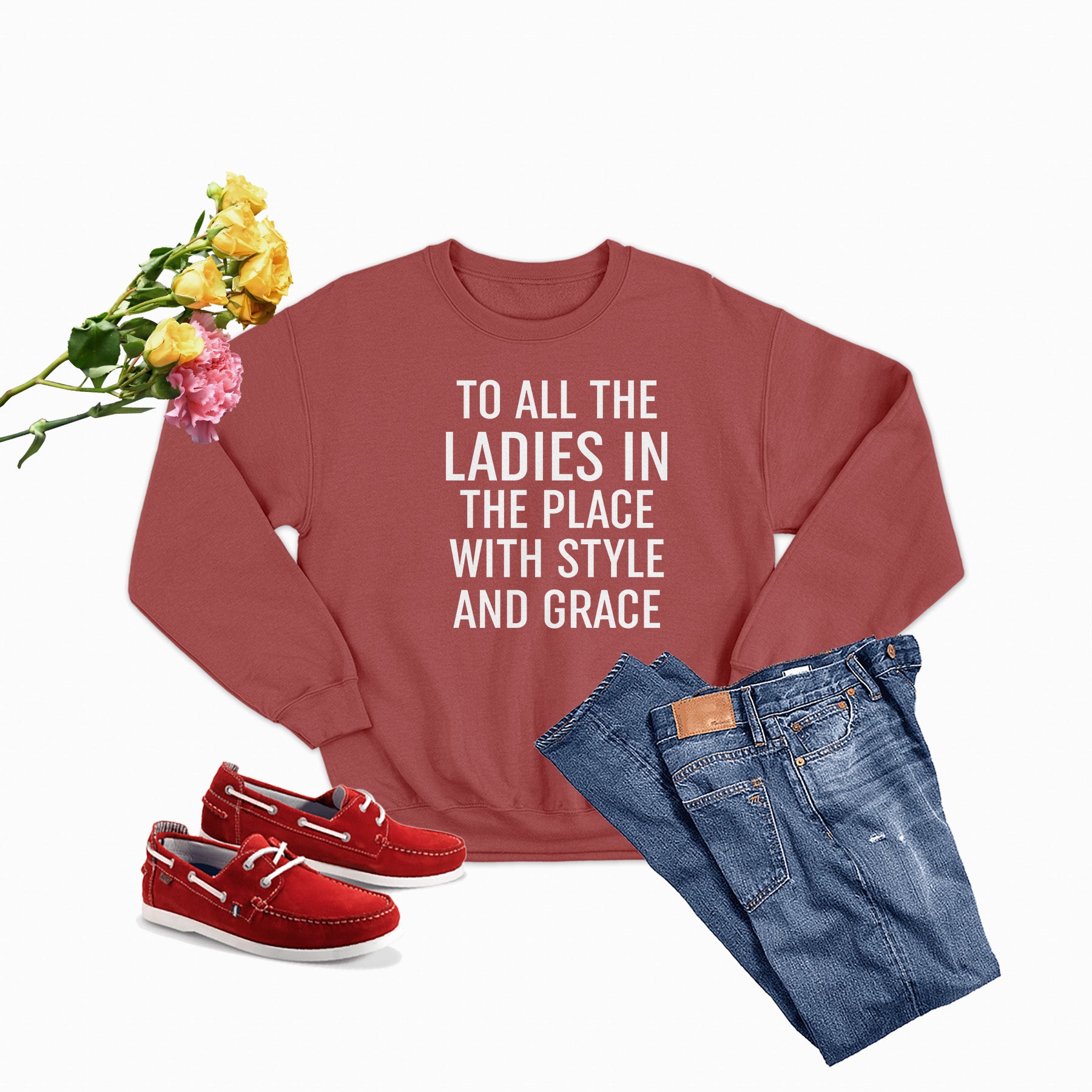 A stylish sweatshirt with the phrase 'To All The Ladies In The Place With Style And Grace' printed on it, showcasing its soft fabric and durable stitching.