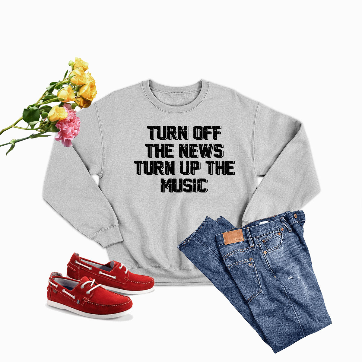 A cozy Turn Up The Music Sweat Shirt made from soft ring-spun cotton, featuring double stitching for durability and a vibrant music-themed design.