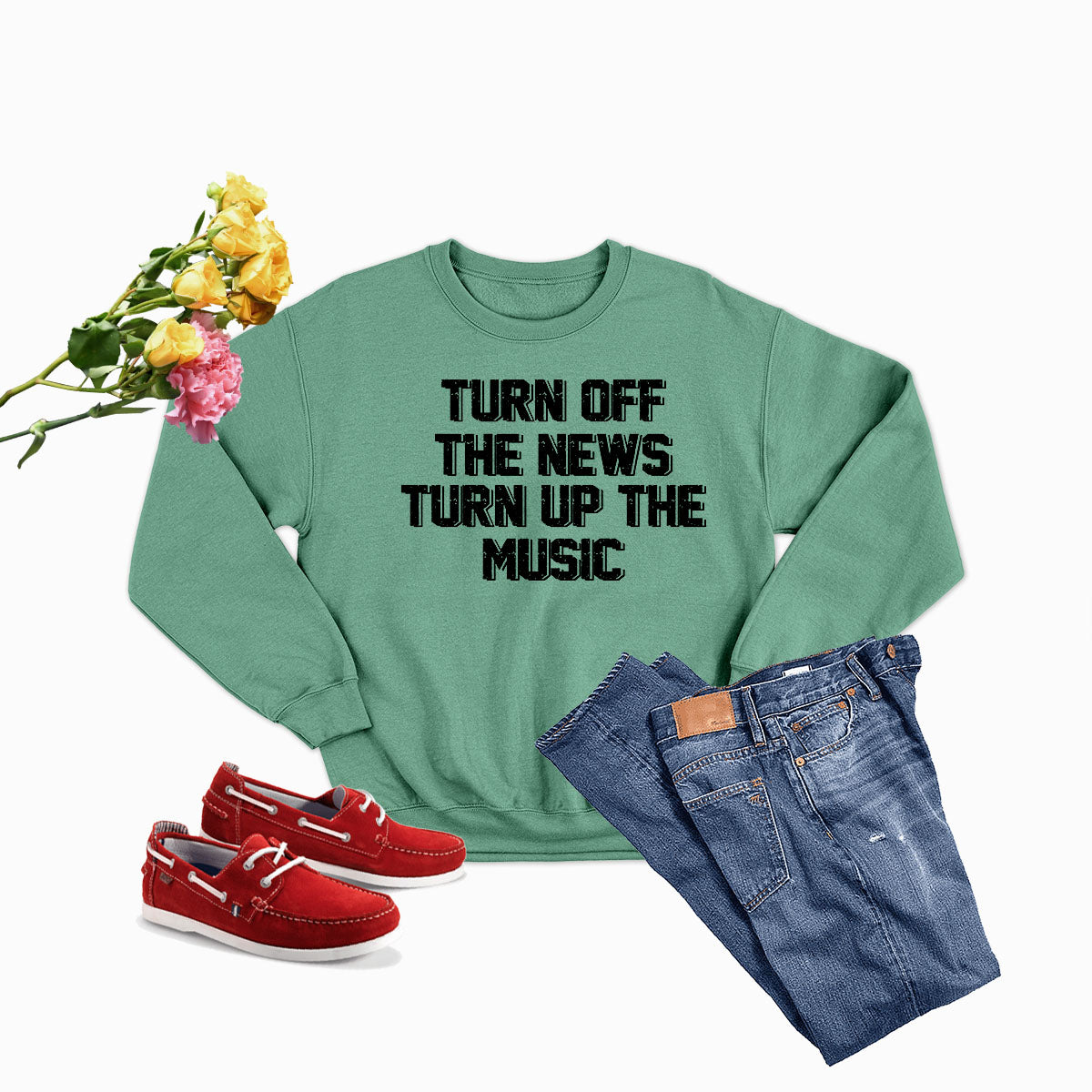 A cozy Turn Up The Music Sweat Shirt made from soft ring-spun cotton, featuring double stitching for durability and a vibrant music-themed design.