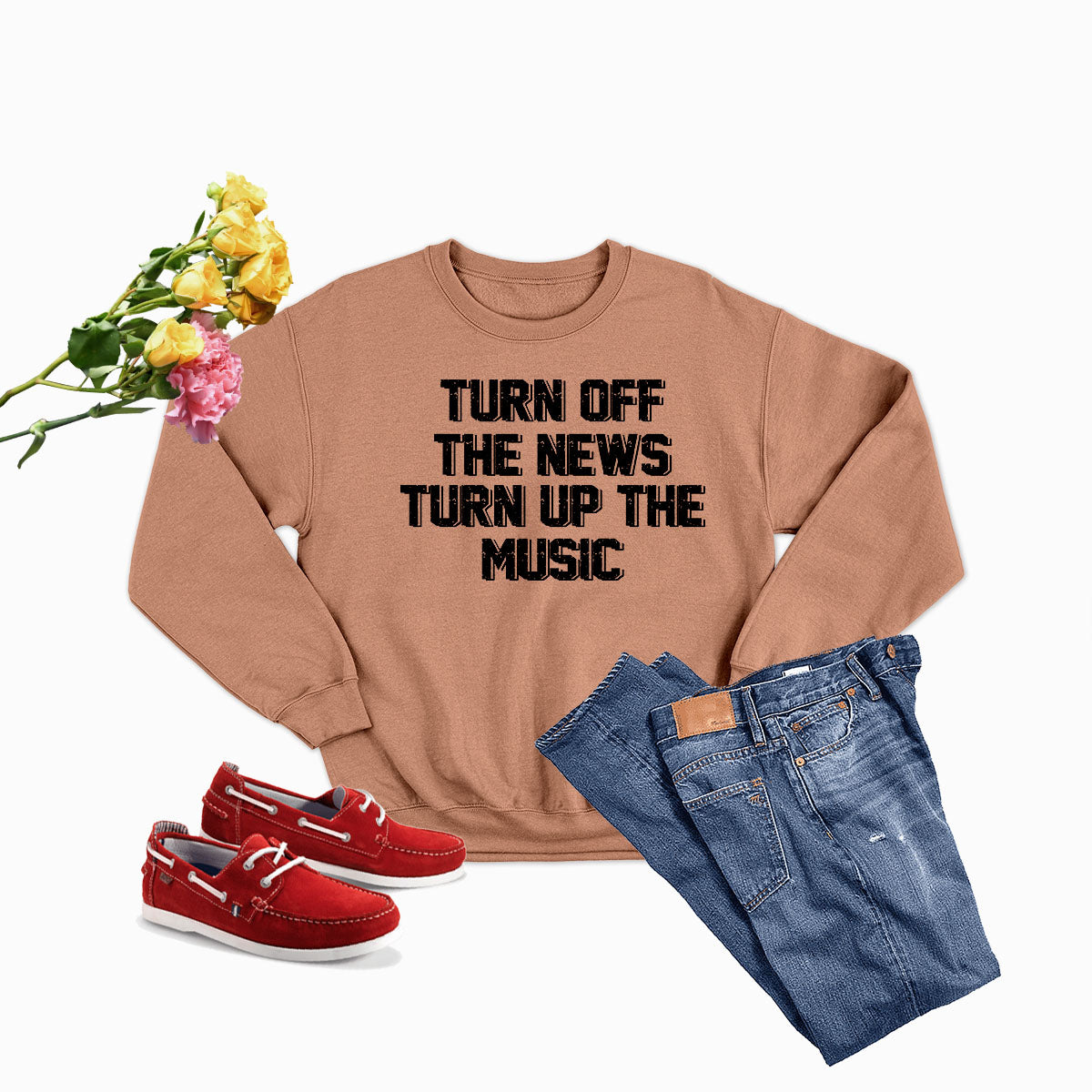 A cozy Turn Up The Music Sweat Shirt made from soft ring-spun cotton, featuring double stitching for durability and a vibrant music-themed design.