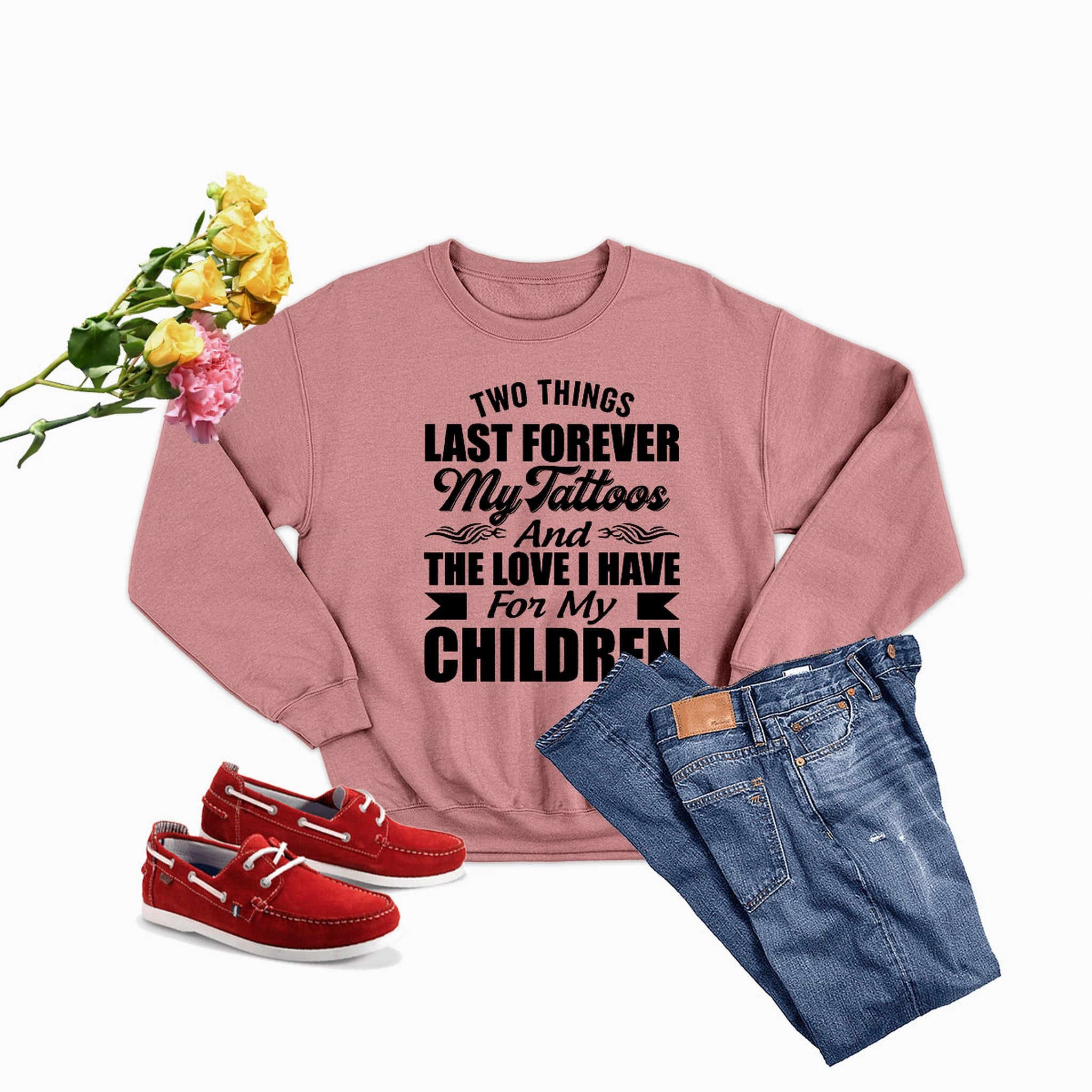 A comfortable t-shirt featuring the phrase 'Two Things Last Forever My Tattoos And The Love I Have For My Children', made from soft cotton.