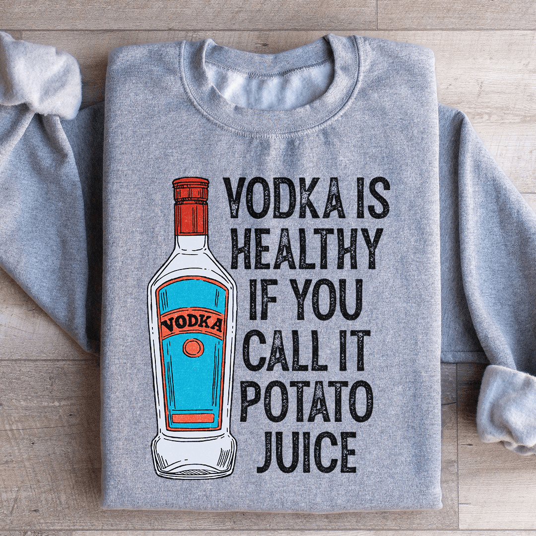 Cozy hoodie featuring the phrase 'Vodka Is Healthy If You Call It Potato Juice', made from cotton/poly fleece blend with adjustable cuffs.