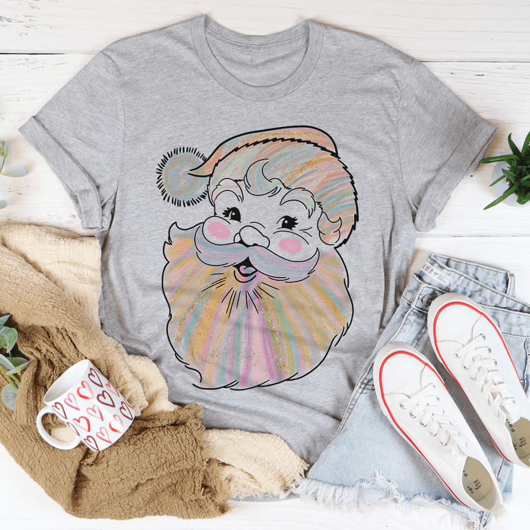 A cozy Watercolor Santa Tee featuring a festive Santa design, made from soft ring-spun cotton with double stitching for durability.