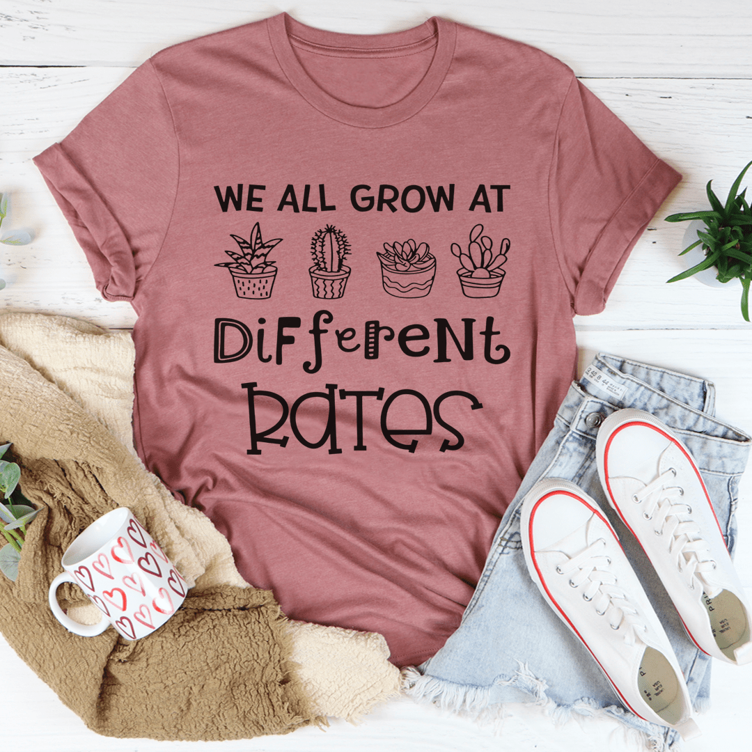 We All Grow At Different Rates T-Shirt made from soft ring-spun cotton, featuring double stitching for durability and a vibrant printed design.