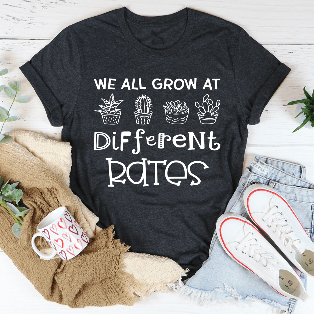 We All Grow At Different Rates T-Shirt made from soft ring-spun cotton, featuring double stitching for durability and a vibrant printed design.