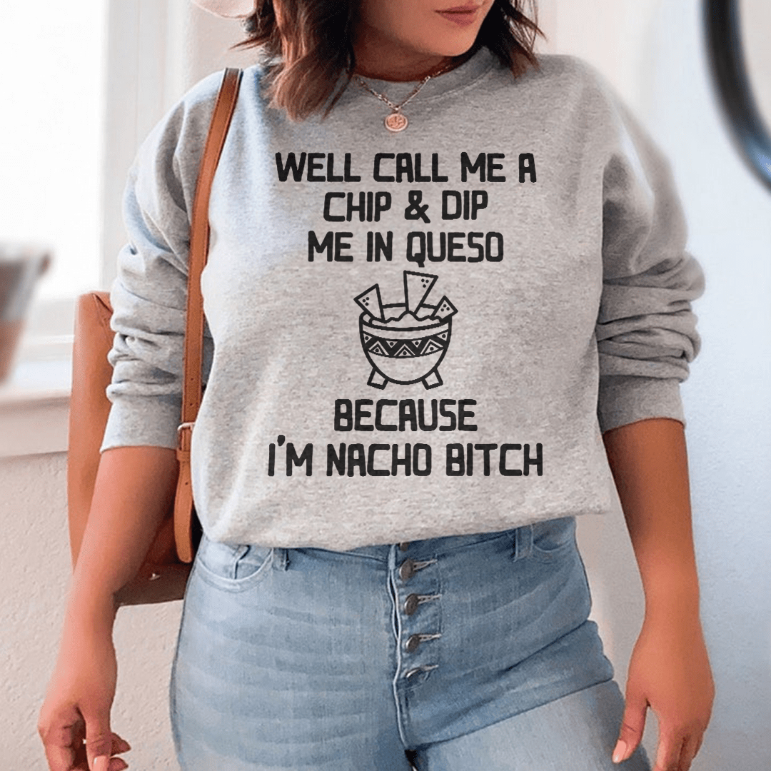 A cozy hoodie featuring a fun design that says 'Well Call Me A Chip & Dip Me In Queso', made from a soft cotton/poly fleece blend.