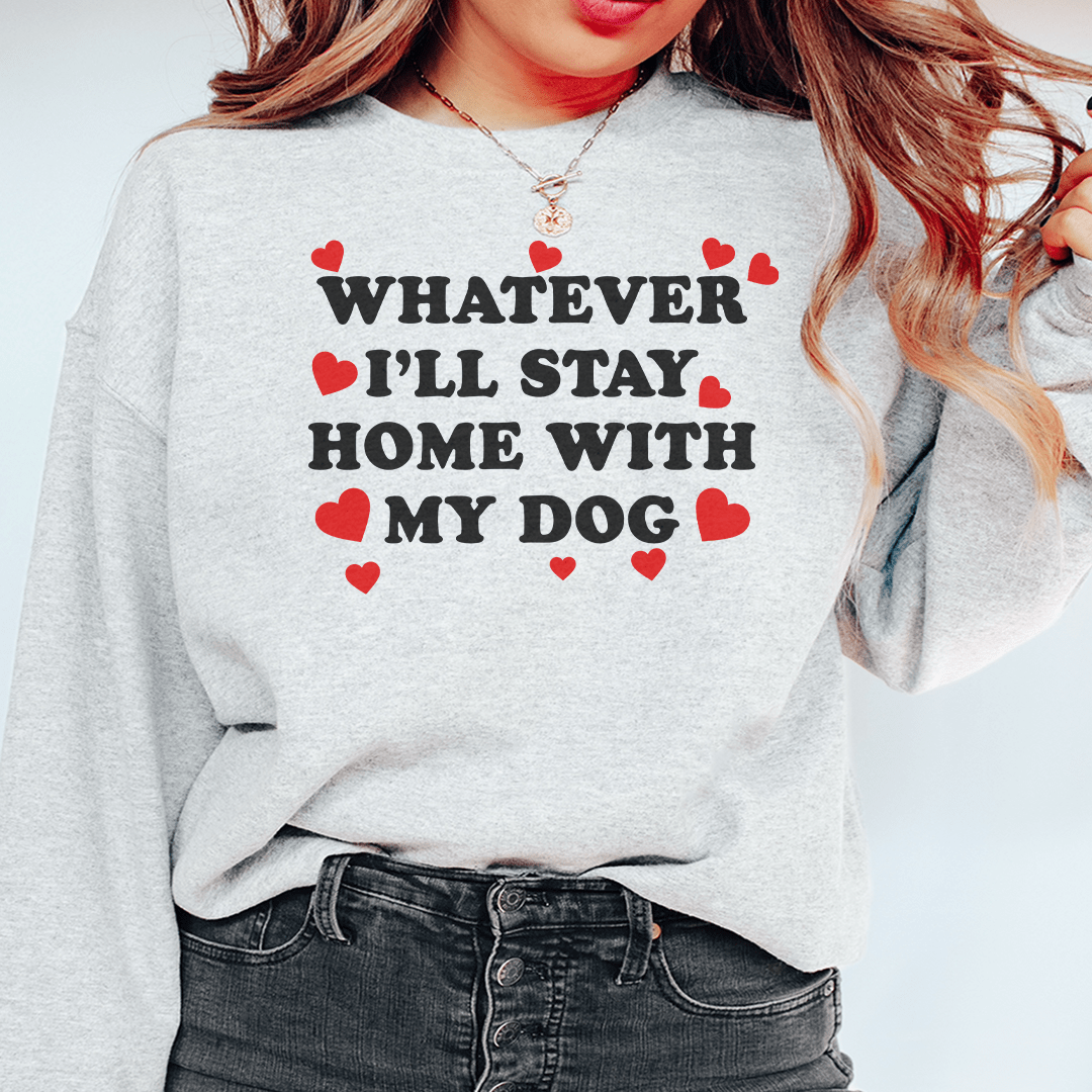 Cozy hoodie with the phrase 'Whatever I'll Stay Home With My Dog', featuring a soft fleece lining and adjustable cuffs.