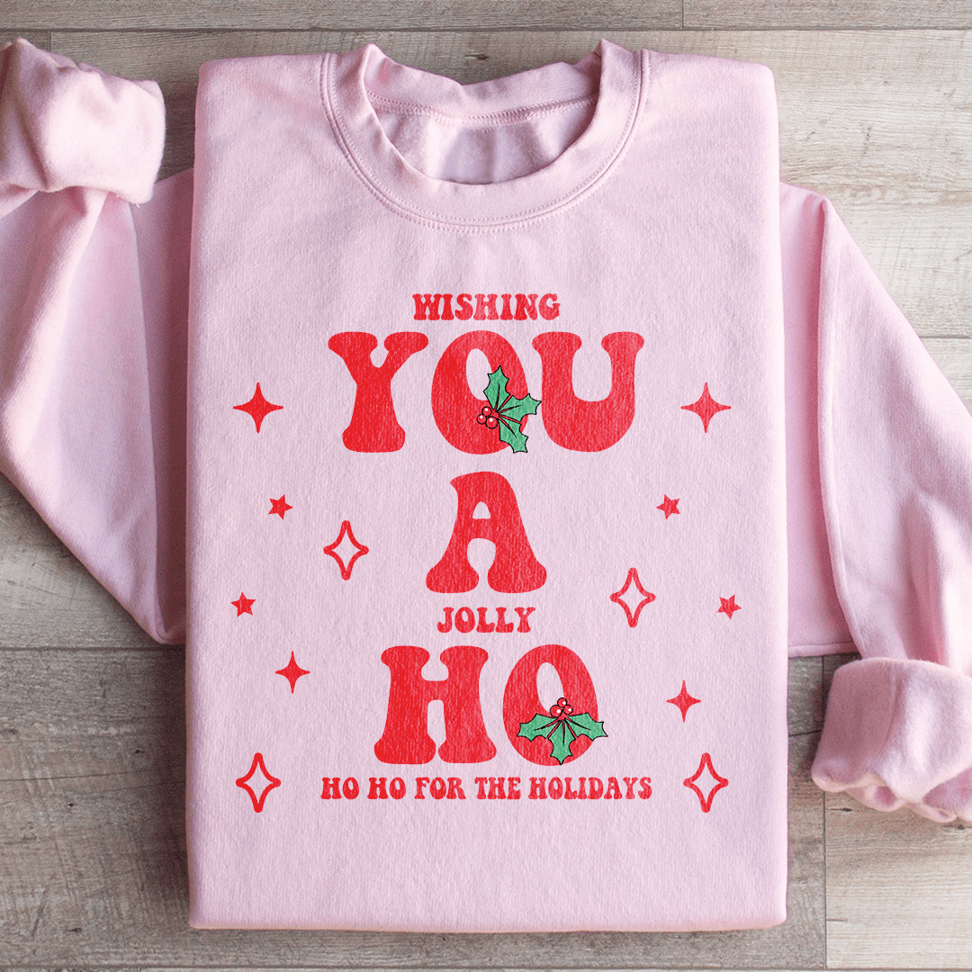 A cozy holiday sweatshirt featuring 'Wishing You A Jolly Ho Ho Ho' design, made from cotton/poly fleece blend with adjustable cuffs.