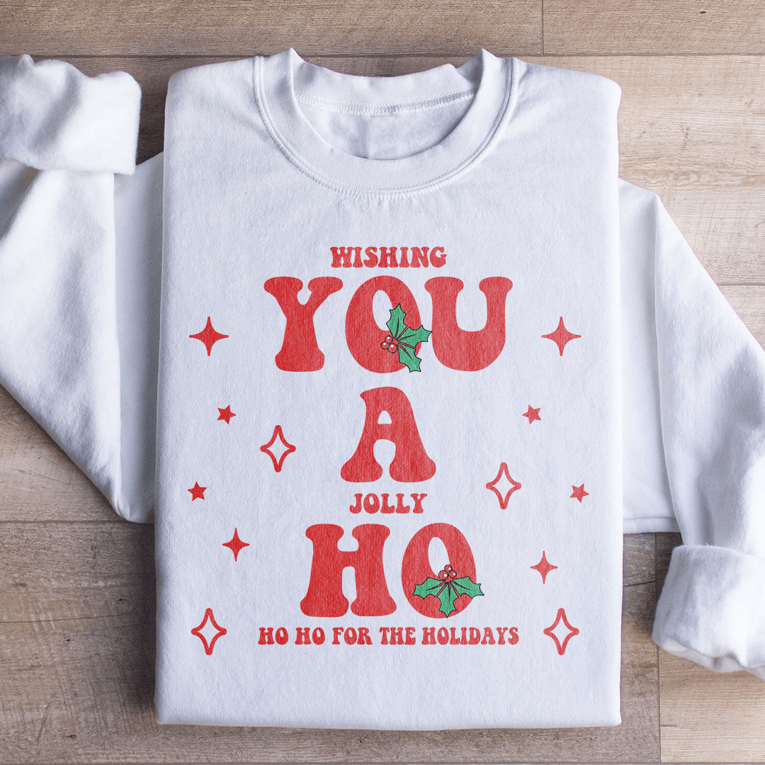 A cozy holiday sweatshirt featuring 'Wishing You A Jolly Ho Ho Ho' design, made from cotton/poly fleece blend with adjustable cuffs.