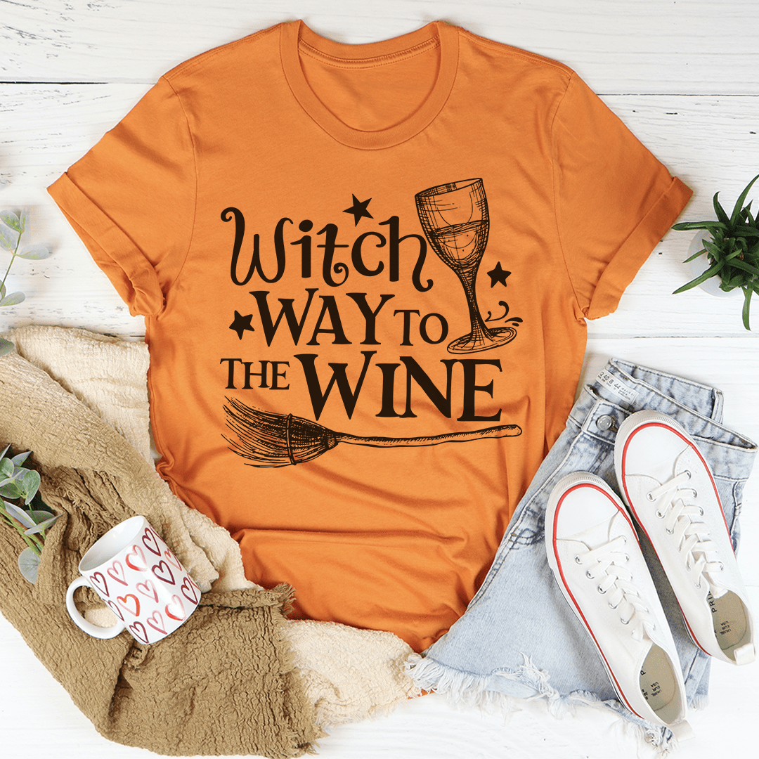 Witch Way To The Wine T-Shirt featuring a playful design, made from soft ring-spun cotton with durable stitching.