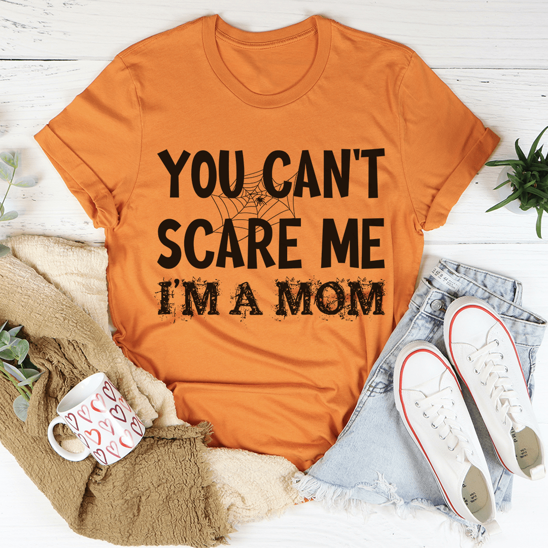 You Can't Scare Me I'm A Mom Tee in soft cotton with double stitching, showcasing a playful slogan for proud moms.