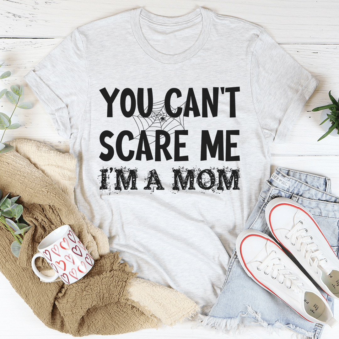 You Can't Scare Me I'm A Mom Tee in soft cotton with double stitching, showcasing a playful slogan for proud moms.