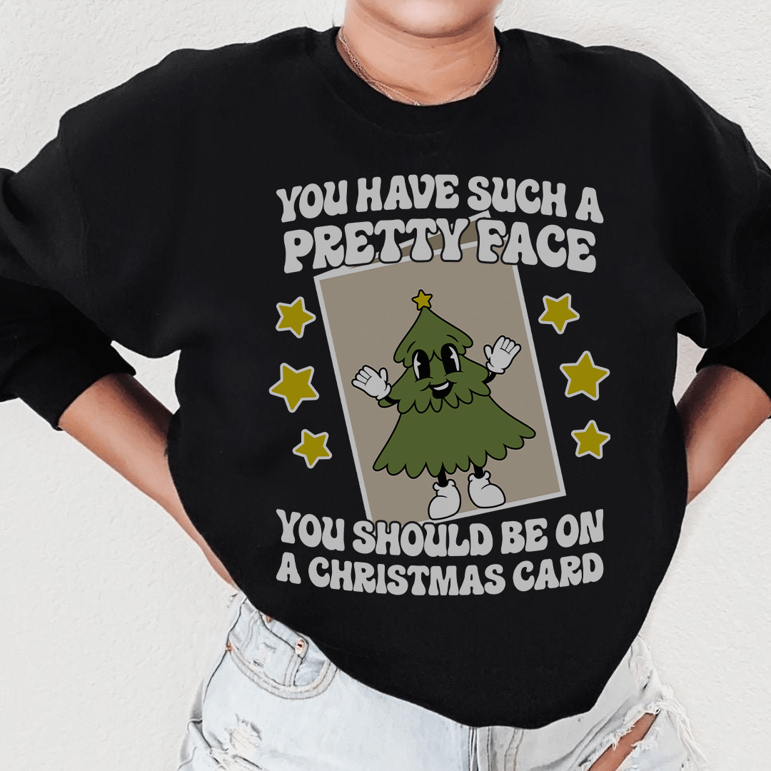 A stylish hoodie featuring the phrase 'You Have Such A Pretty Face', designed by top artists, showcasing a cozy fleece material.