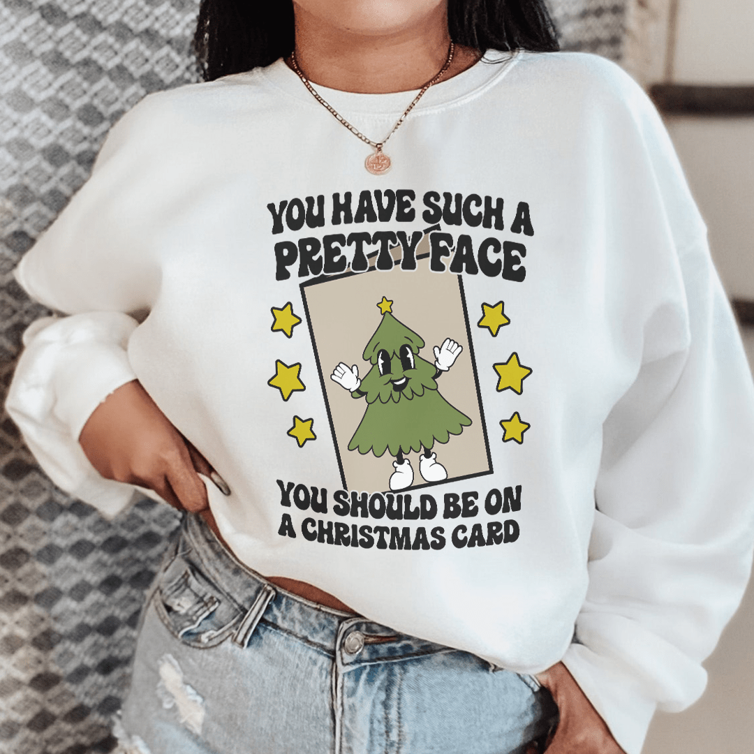 A stylish hoodie featuring the phrase 'You Have Such A Pretty Face', designed by top artists, showcasing a cozy fleece material.