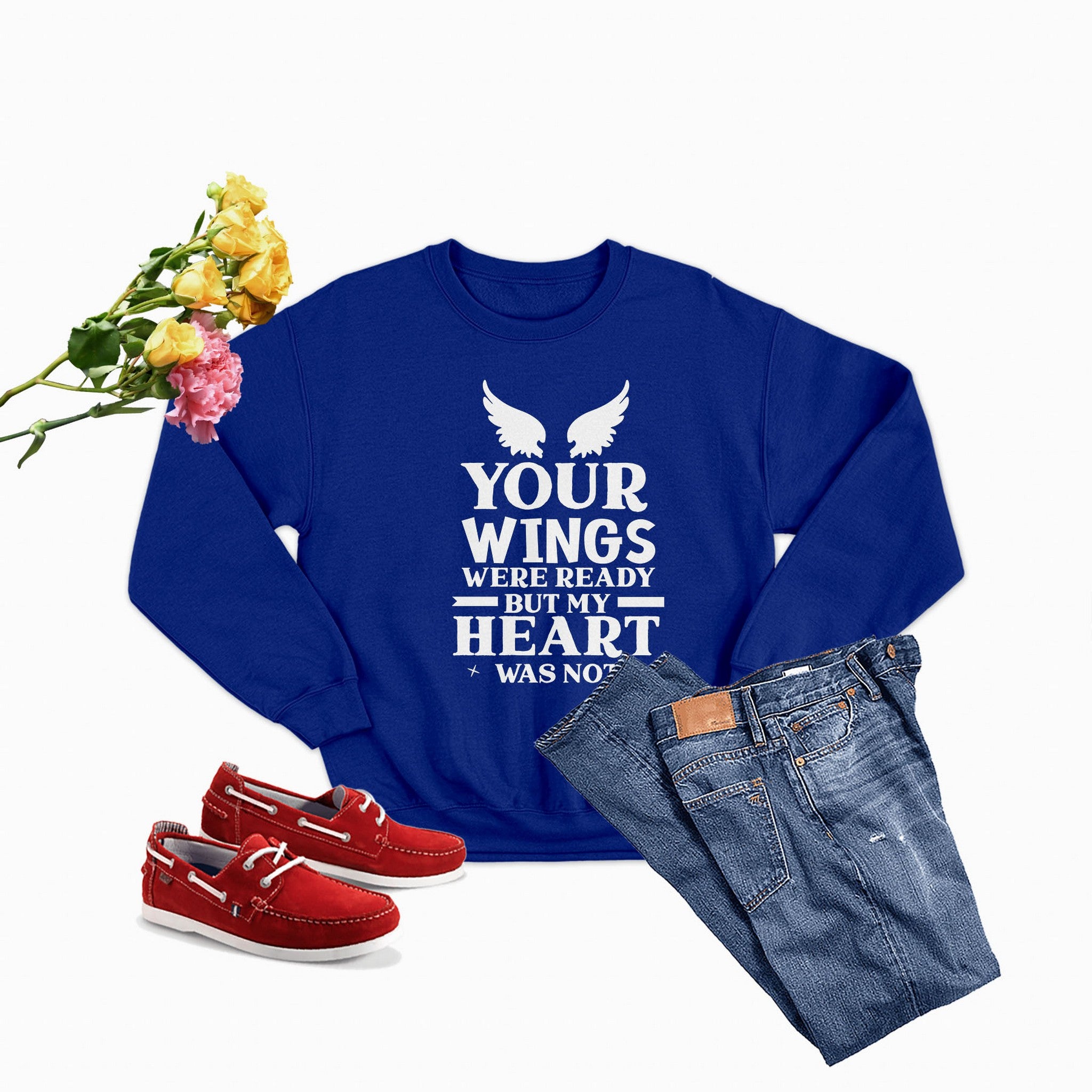 A cozy 'Your Wings Were Ready But...' Sweat Shirt featuring a unique artistic design, made from a warm cotton/poly fleece blend.