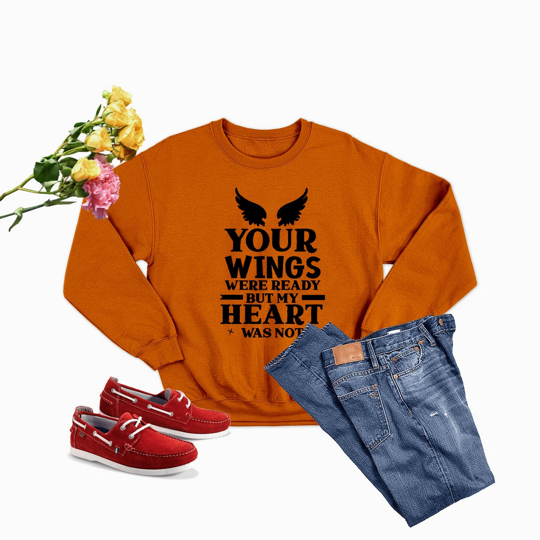 A cozy 'Your Wings Were Ready But...' Sweat Shirt featuring a unique artistic design, made from a warm cotton/poly fleece blend.