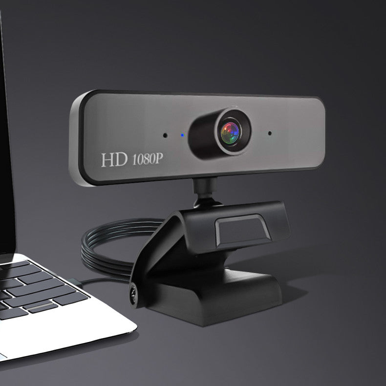 1080P HD Video Camera with built-in microphone, showcasing its sleek design and compact size.