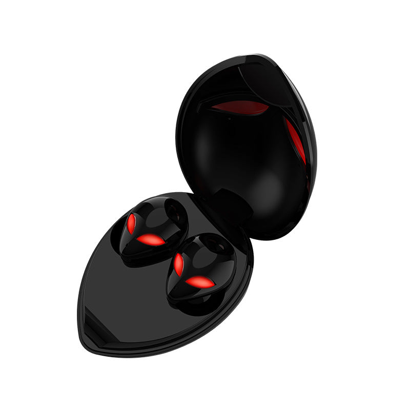 Creative Outer T8 Starman Bluetooth Headset featuring an alien design with red and blue lights, wireless charging case, and sleek earbuds.