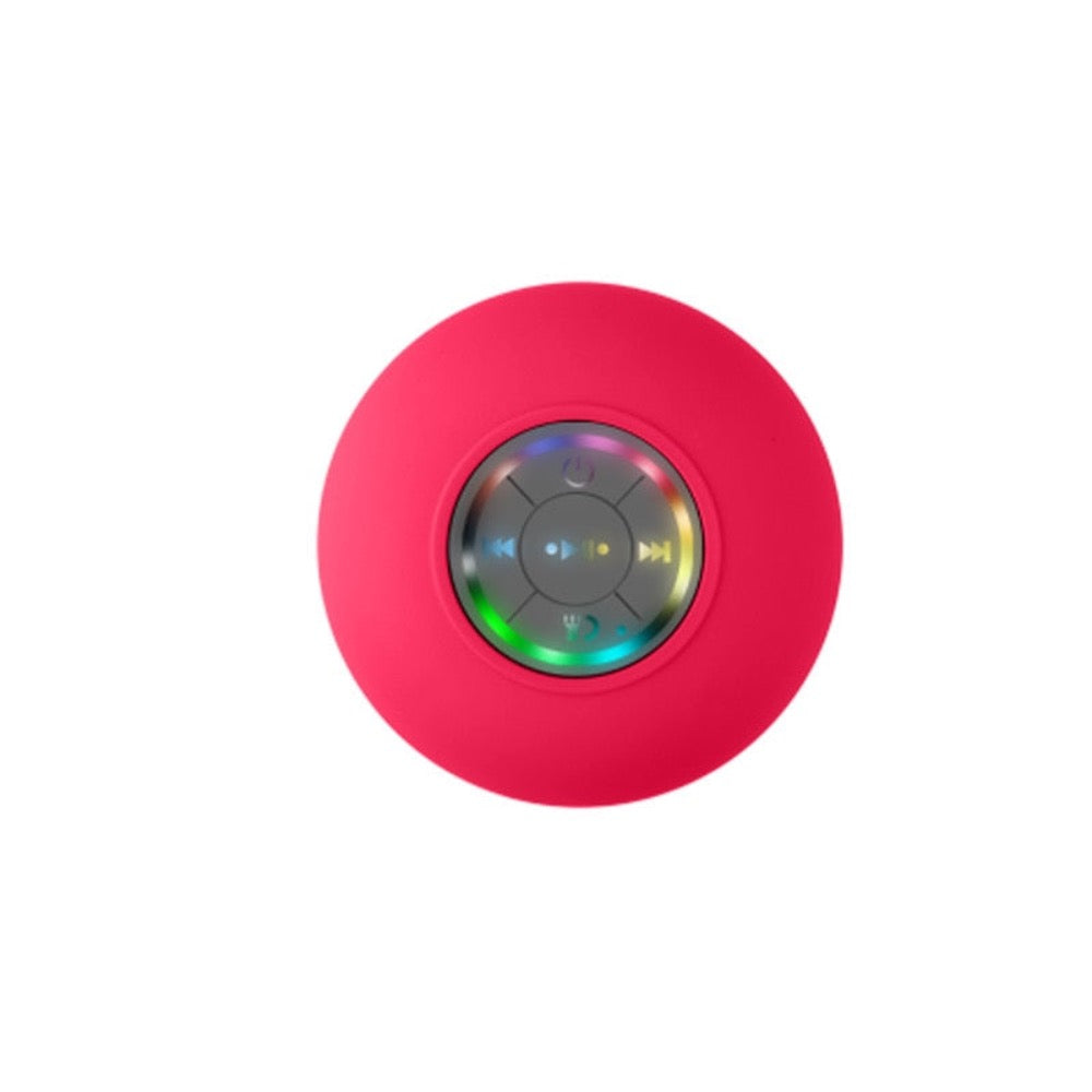 Mini Waterproof RGB Bluetooth Speaker with vibrant LED lights and a strong suction cup, designed for versatile audio enjoyment.