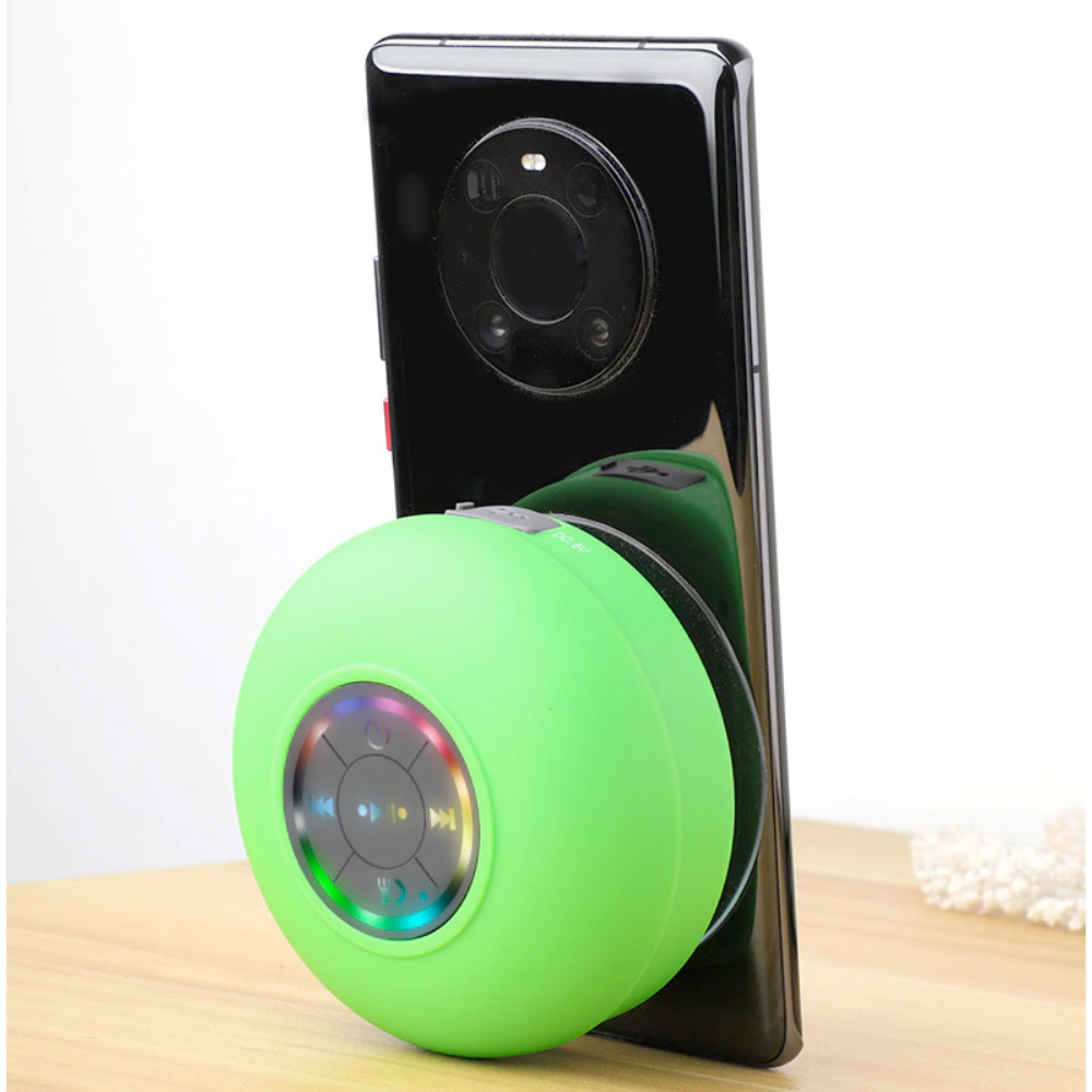 Mini Waterproof RGB Bluetooth Speaker with vibrant LED lights and a strong suction cup, designed for versatile audio enjoyment.