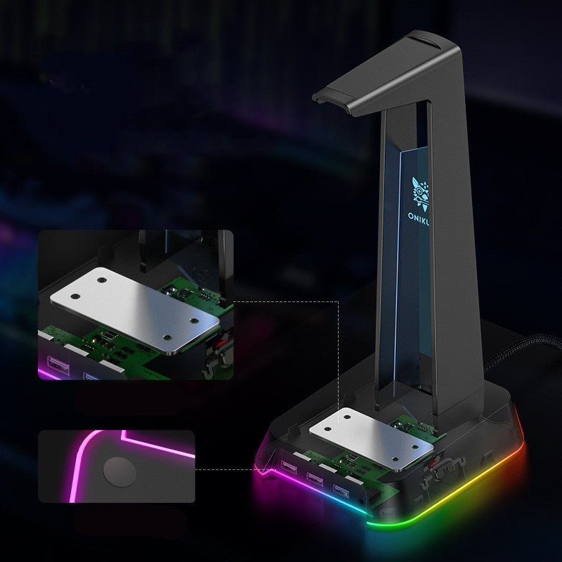 Stand Illuminated Headphone Display Stand in black with RGB lighting, showcasing its sleek design and USB ports.