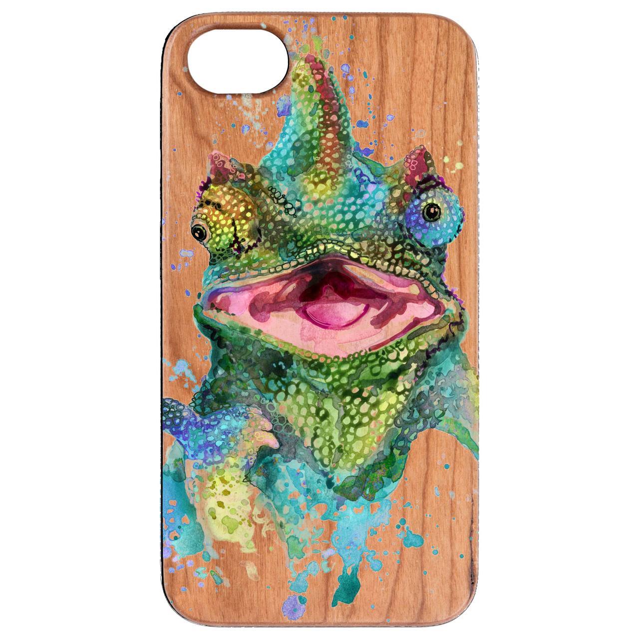 Chameleon UV Color Printed phone case showcasing vibrant designs on a natural wood surface with a rubber bumper.