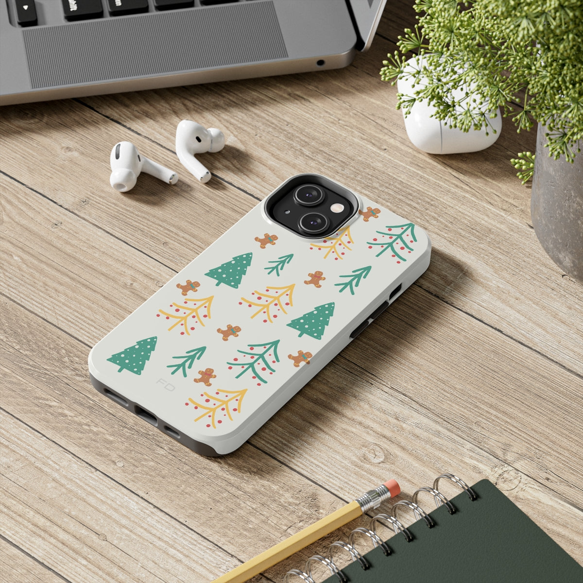 Christmas Tree's Tough Case for iPhone featuring a glossy finish, impact-resistant polycarbonate shell, and rubber lining for extra protection.