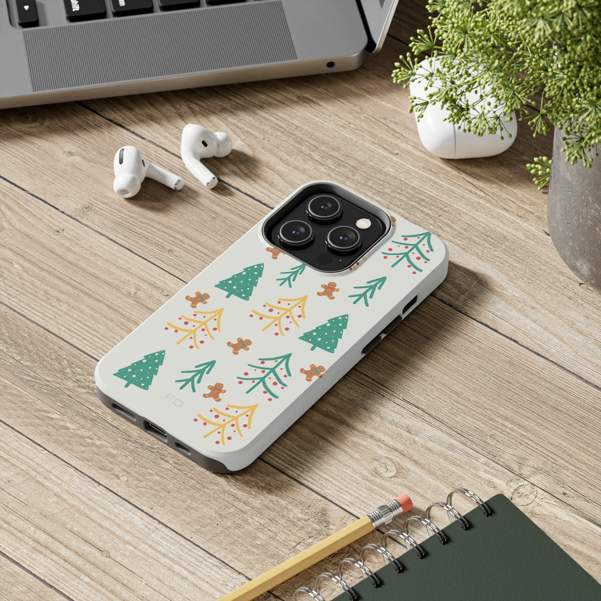 Christmas Tree's Tough Case for iPhone featuring a glossy finish, impact-resistant polycarbonate shell, and rubber lining for extra protection.