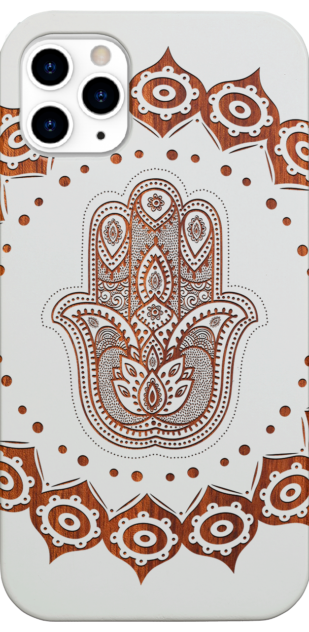 Hamsa Mandala Engraved wooden phone case showcasing intricate design and natural wood finish.