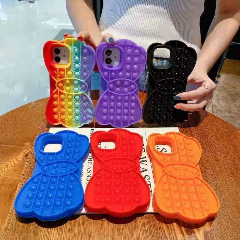 Relieve Stress Toys Push It Bubble Phone Case in vibrant colors, featuring bubble push design for stress relief and mobile protection.