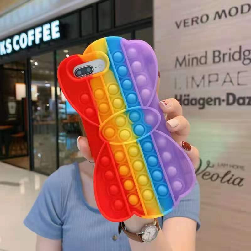 Relieve Stress Toys Push It Bubble Phone Case in vibrant colors, featuring bubble push design for stress relief and mobile protection.