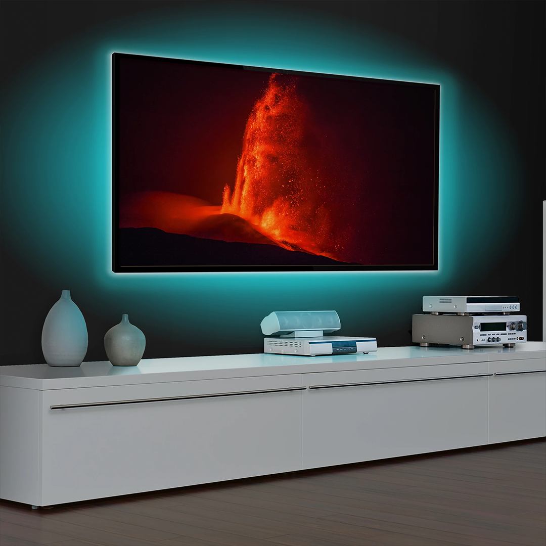 LED TV Mood Light with colorful LED strip illuminating a TV, showcasing vibrant colors and remote control.