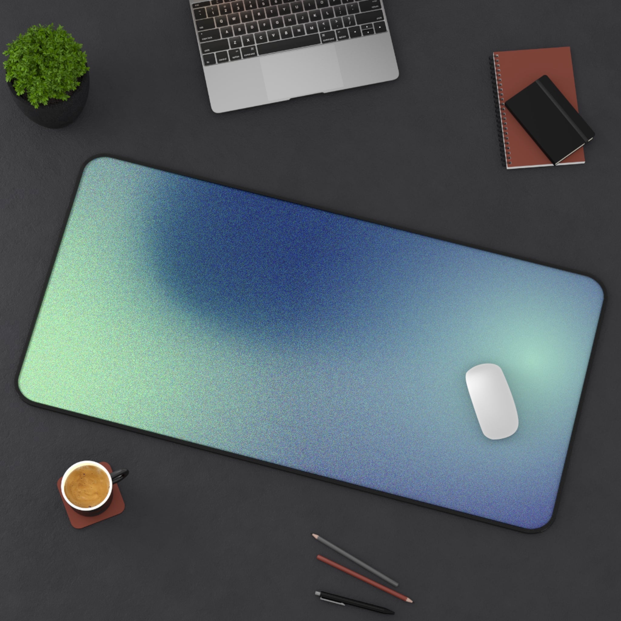 Blue Astronomy Space Desk Mat featuring a cosmic design, 4mm thick neoprene material, anti-slip backing, and hemmed edges for durability.