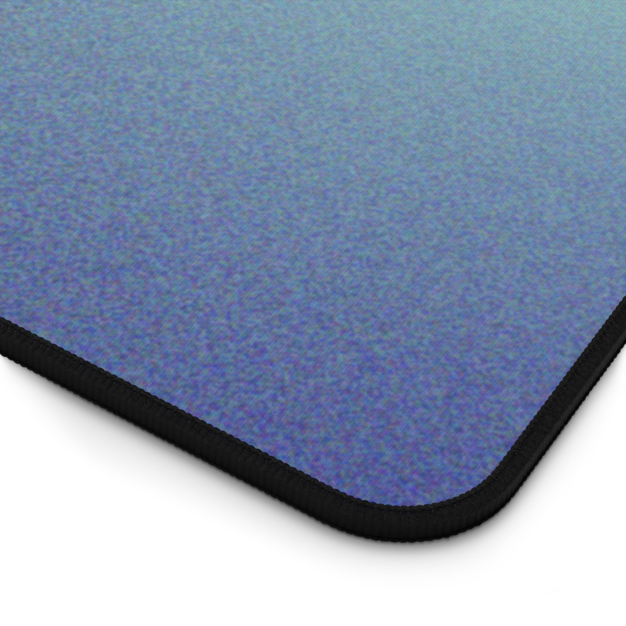 Blue Astronomy Space Desk Mat featuring a cosmic design, 4mm thick neoprene material, anti-slip backing, and hemmed edges for durability.