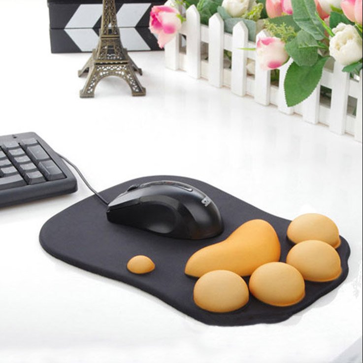 A Comfortable Cat Claw Mouse Pad made of silicone, featuring a playful cat claw design, measuring 200 x 273 x 23mm, perfect for enhancing workspace aesthetics.