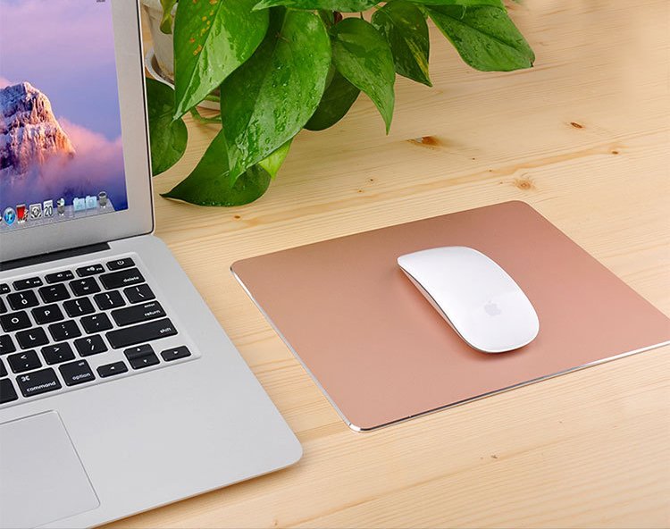 Double Surface Aluminum Mouse Pad in Gold color with anti-skid PU leather backing, showcasing its sleek design and smooth surface.