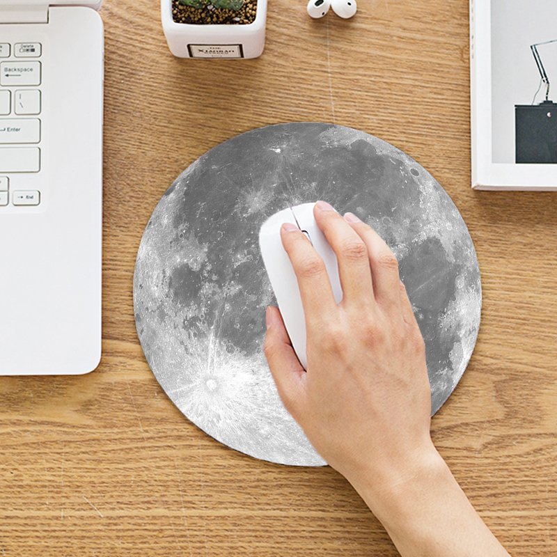 Moon Mouse Pad featuring a silky smooth surface and anti-slip rubber base, designed for comfort and optimal mouse movement.